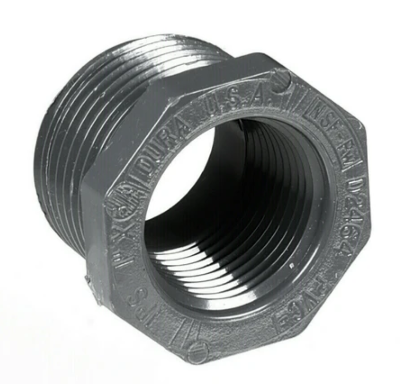 Gray polypropylene reducer bushing with external male threads and internal female threads